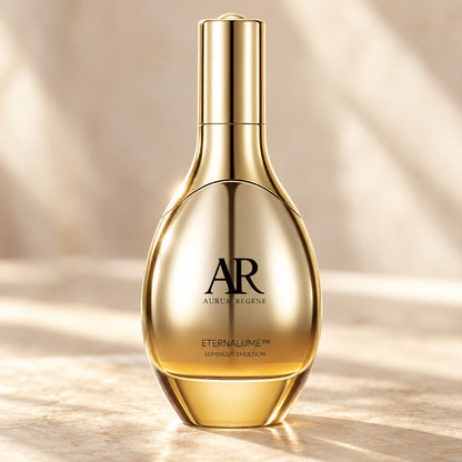 Luminous Emulsion gold bottle in soft studio light